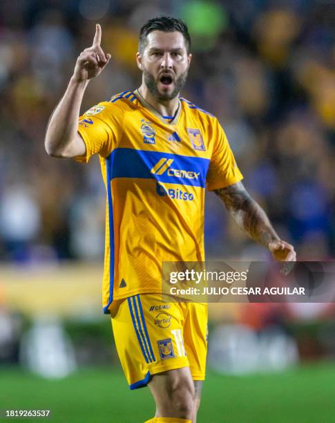 Tigres' French forward Andre-Pierre Gignac celebrates after scoring against Puebla during their Mexican Apertura 2023 football tournament match at...