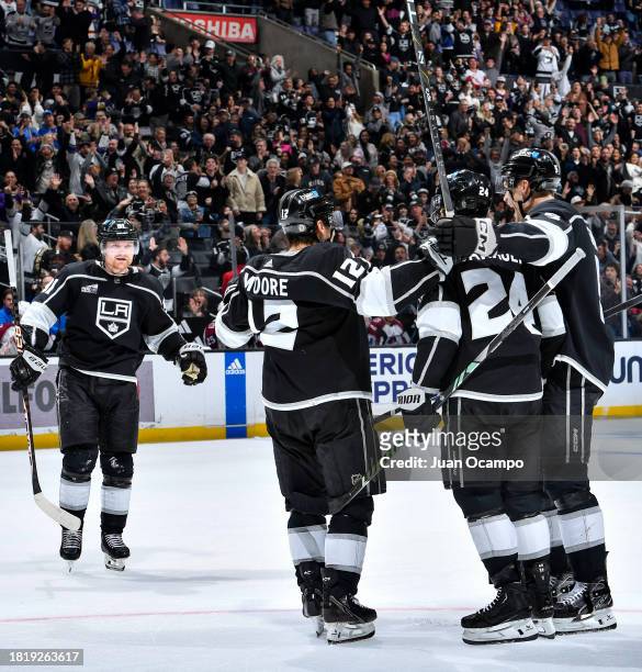 Trevor Moore of the Los Angeles Kings celebrates his goal with teammates during the third period against the Colorado Avalanche at Crypto.com Arena...