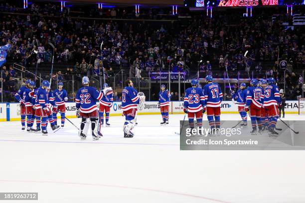 The New York Rangers salute their fans following the National Hockey League game between the San Jose Sharks and the New York Rangers on December 3,...
