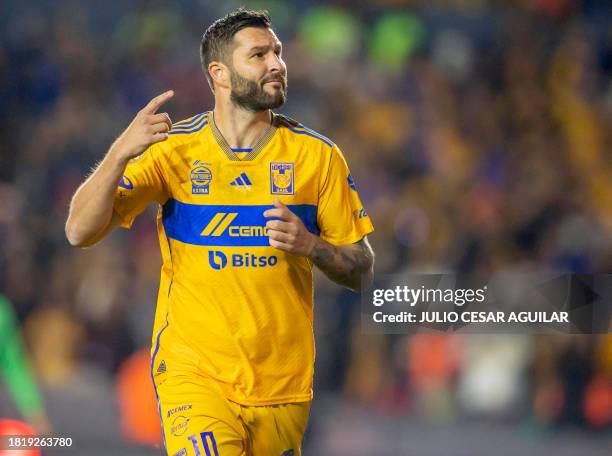 Tigres' French forward Andre-Pierre Gignac celebrates after scoring against Puebla during their Mexican Apertura 2023 football tournament match at...