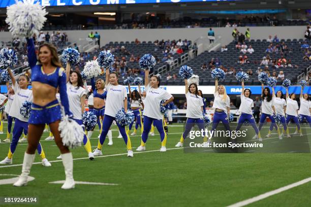 Rams Junior Cheerleaders participants from Japan perform on the field before the NFL game between the Los Angeles Rams and the Cleveland Browns on...