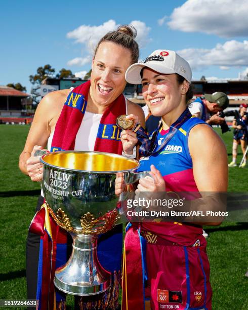 Former Lions premiership Captain Emma Zielke and Ally Anderson of the Lions pose for a photo during the 2023 AFLW Grand Final match between The North...