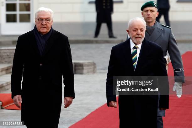 German President Frank-Walter Steinmeier and Brazilian President Luiz Inacio Lula da Silva review a guard of honour upon Lula's arrival at Schloss...