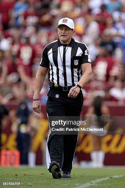 Referee Ed Hochuli in action in the first half during a game between the Detroit Lions and Washington Redskins at FedExField on September 22, 2013 in...