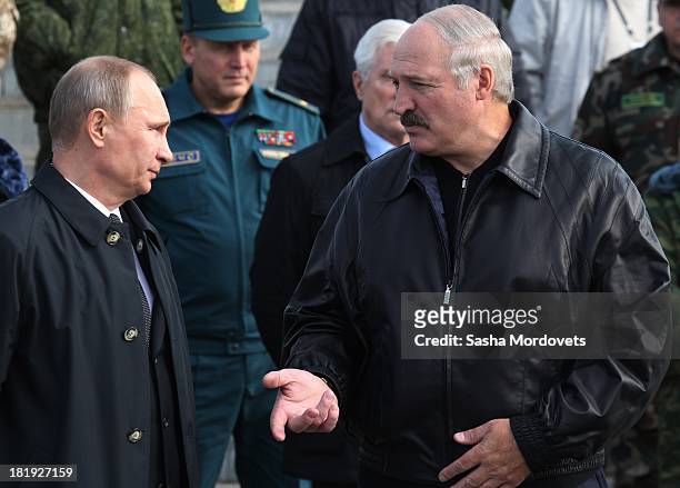 Russian President Vladimir Putin and Belarussian President Alexander Lukashenko attend a joint Russian-Belarussian military exercises at the polygon...