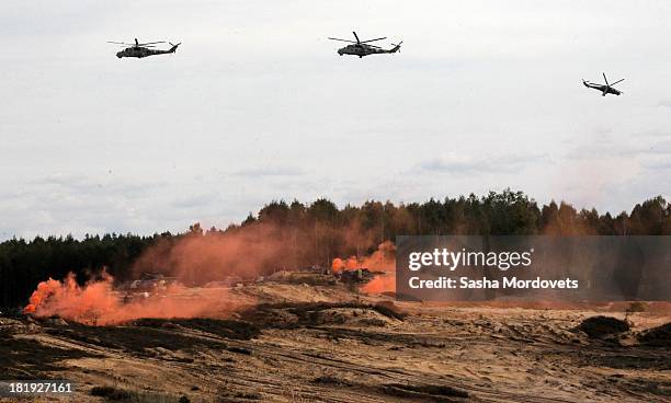 Helicopters are seen during a joint Russian-Belarussian military exercise at the polygon on September 26, 2013 in Grodno, Belarus.