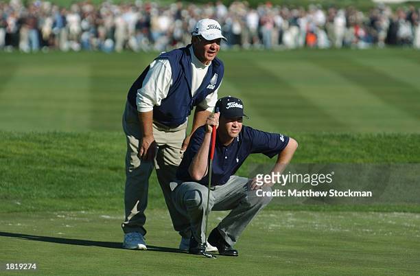 Davis Love III lines up his putt during the final round of the AT&T Pebble Beach National Pro-Am on February 9, 2003 at Pebble Beach Golf Links in...
