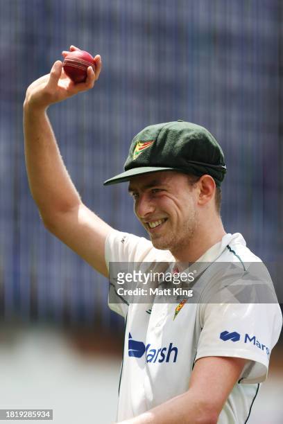 Lawrence Neil-Smith of the Tigers celebrates taking the final wicket of Chris Tremain of New South Wales during the Sheffield Shield match between...