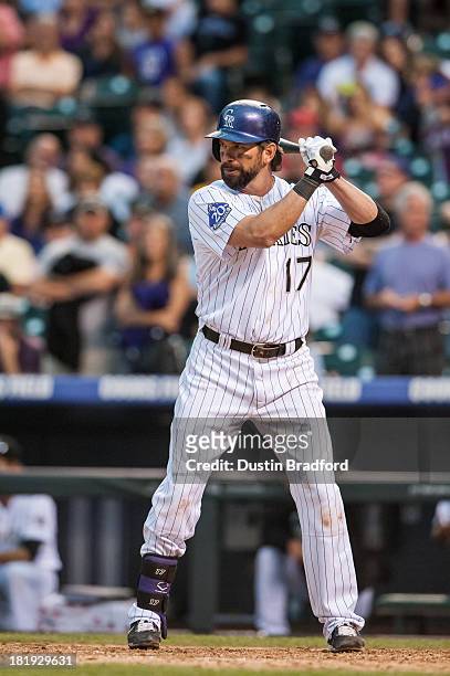 Todd Helton of the Colorado Rockies bats in the ninth inning of a game against the Arizona Diamondbacks at Coors Field on September 22, 2013 in...