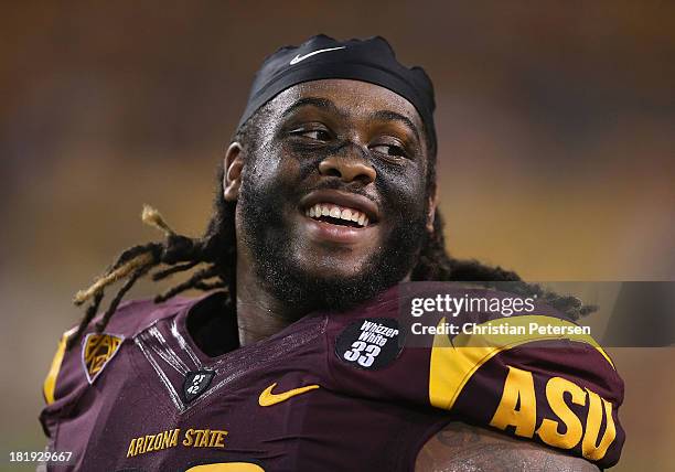 Defensive tackle Will Sutton of the Arizona State Sun Devils reacts on the sidelines during the college football game against the Sacramento State...