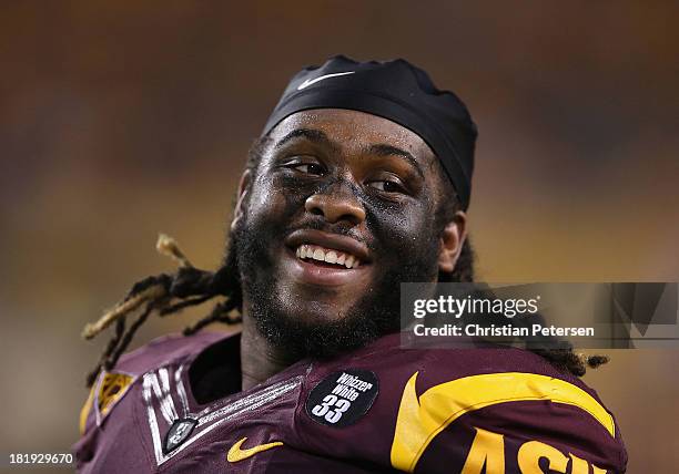 Defensive tackle Will Sutton of the Arizona State Sun Devils reacts on the sidelines during the college football game against the Sacramento State...