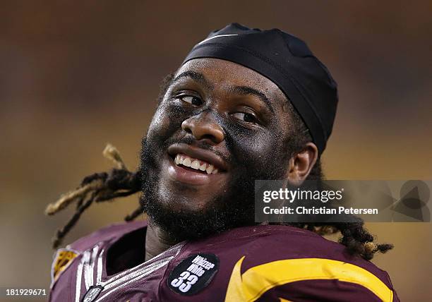 Defensive tackle Will Sutton of the Arizona State Sun Devils reacts on the sidelines during the college football game against the Sacramento State...