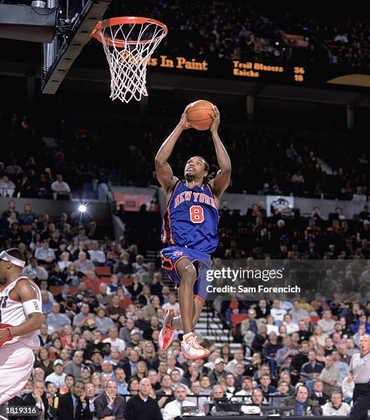 Latrell Sprewell of the New York Knicks makes a layup during the NBA game against the Portland Trail Blazers at The Rose Garden on February 17, 2003...