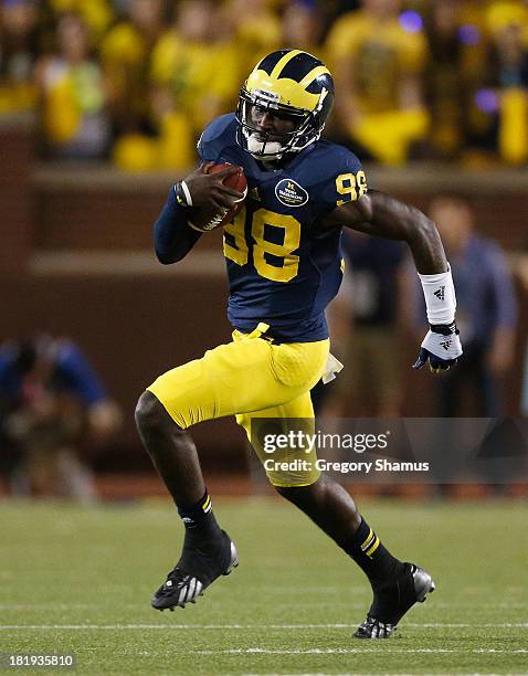 Devin Gardner of the Michigan Wolverines gets loose for a long run while playing the Notre Dame Fighting Irish at Michigan Stadium on September 7,...