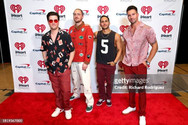 Logan Henderson, Kendall Schmidt, Carlos PenaVega and James Maslow of Big Time Rush attend iHeartRadio 106.1 KISS FM's Jingle Ball 2023 presented by...