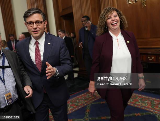 Speaker of the House Mike Johnson and Rep. Celeste Maloy's arrive for a photo-op for her ceremonial swearing-in at the U.S. Capitol on November 28,...