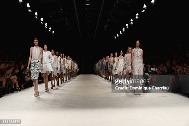 Models walk the runway during Nina Ricci show as part of the Paris Fashion Week Womenswear Spring/Summer 2014 on September 26, 2013 in Paris, France.