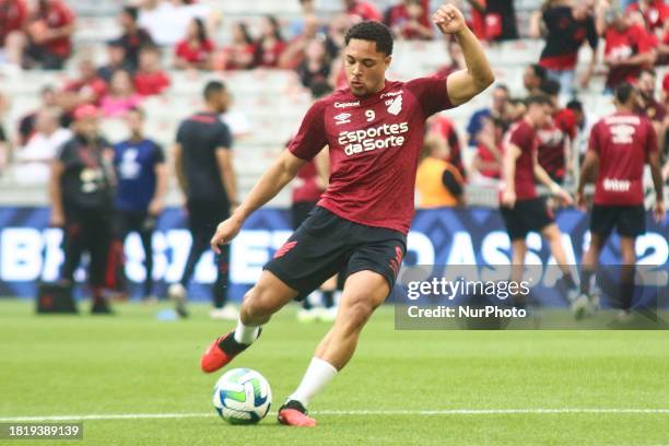 Vitor Roque, an Athletico PR player, is warming up before the match against Santos at Arena da Baixada in Curitiba, Brazil.