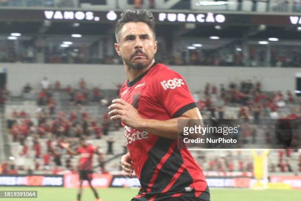 Athletico PR player Willian Bigode is celebrating his goal during the match against Santos for the Brazilian League Serie A 2023 Round 37 at Arena da...