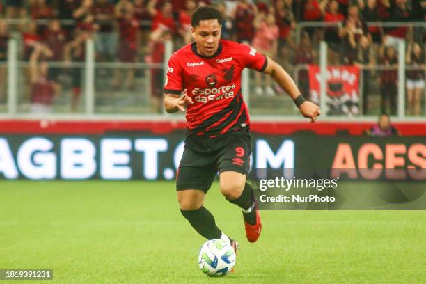 Vitor Roque of Athletico PR is playing in the match against Santos in Round 37 of the Brazilian League Serie A 2023 at Arena da Baixada Stadium in...