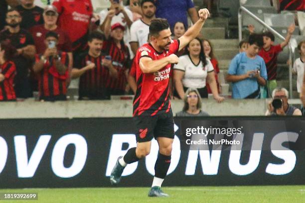 Athletico PR player Willian Bigode is celebrating his goal during the match against Santos for the Brazilian League Serie A 2023 Round 37 at Arena da...