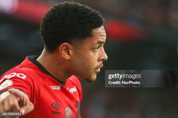 Vitor Roque of Athletico PR is playing in the match against Santos in Round 37 of the Brazilian League Serie A 2023 at Arena da Baixada Stadium in...