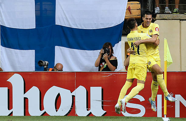 Villarreal's French forward Jeremy Perbet celebrates with Villarreal's Paraguayan midfielder Hernan Perez after scoring during the Spanish league...