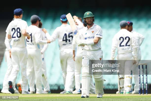 Charlie Wakim of the Tigers walks from the field after being dismissed during the Sheffield Shield match between New South Wales and Tasmania at SCG,...