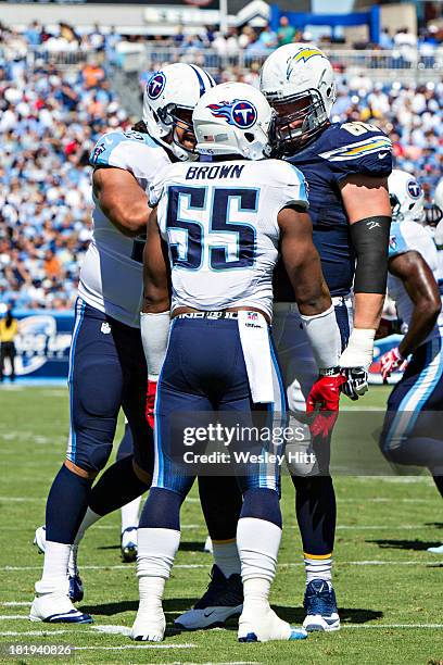 Jeromey Clary of the San Diego Chargers and Zach Brown of the Tennessee Titans square off against each other at LP Field on September 22, 2013 in...