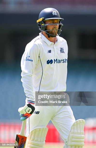 Fergus O'Neill of the Bushrangers leaves the ground after getting out to Brendan Doggett of the Redbacks during the Sheffield Shield match between...