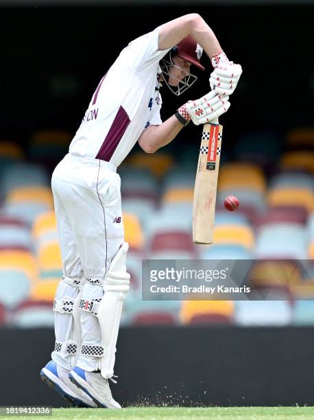 Jack Clayton of Queensland plays a shot during day two of the Sheffield Shield match between Queensland and Western Australia at The Gabba, on...