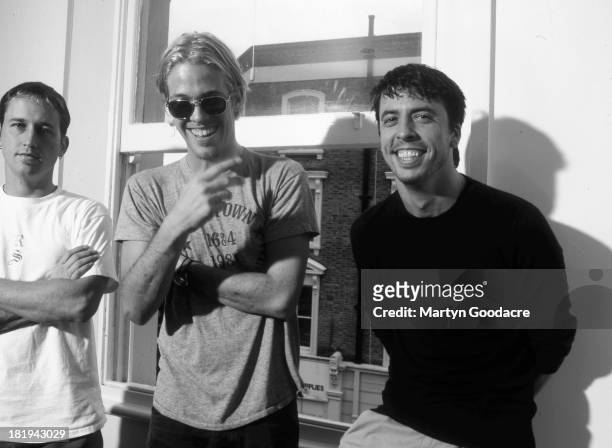 Foo Fighters group portrait, London, 1997. L to R: Chris Shiflett, Taylor Hawkins, Dave Grohl.