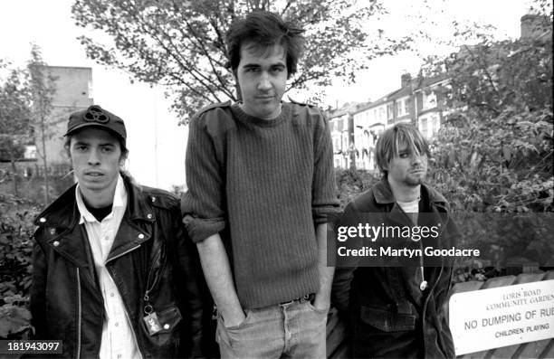 Group portrait of American grunge band Nirvana in Shepherd's Bush, London, October 1990. L-R Dave Grohl, Krist Novoselic and Kurt Cobain.