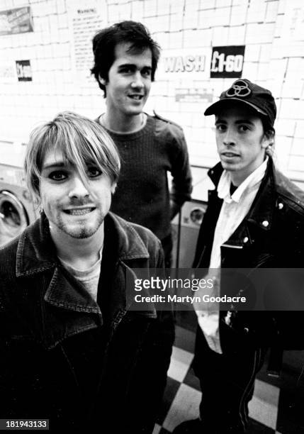Group portrait of American grunge band Nirvana in Shepherd's Bush, London, October 1990. L-R Kurt Cobain, Krist Novoselic and Dave Grohl.