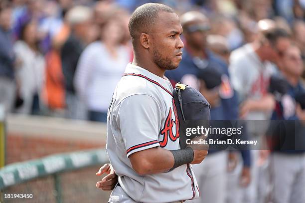 Jose Constanza of the Atlanta Braves stands on the field for the National Anthem before the game against the Chicago Cubs at Wrigley Field on...