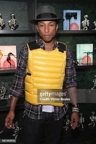 Singer/Producer Pharrell Williams attends the Press Conference for the Moncler New Flagship Opening in Paris at Rue Du Faubourg Saint-Honore on...