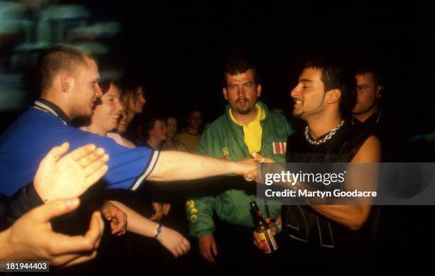 Armand Van Heldon and Fatboy Slim perform in a boxing ring at the Heavyweight DJ Battle, Brixton Academy, London, 1999.