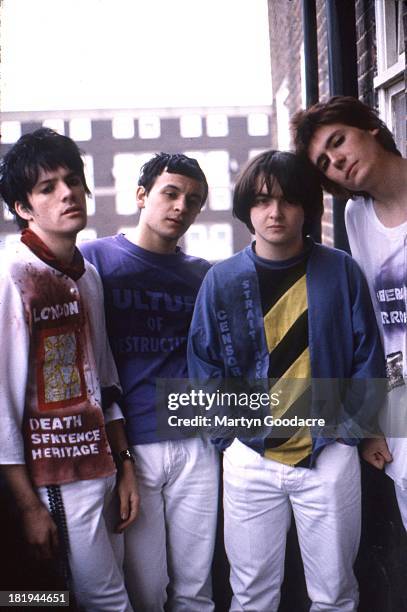 Group portrait of the Manic Street Preachers at Martyn Goodacre's flat, Old Kent Road, London, January 1991. L-R Richey Edwards, James Dean...