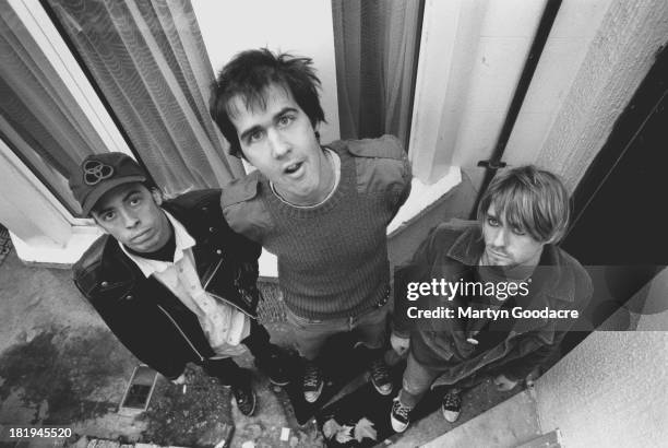 Group portrait of American grunge band Nirvana in Shepherd's Bush, London, October 1990. L-R Dave Grohl, Krist Novoselic and Kurt Cobain.