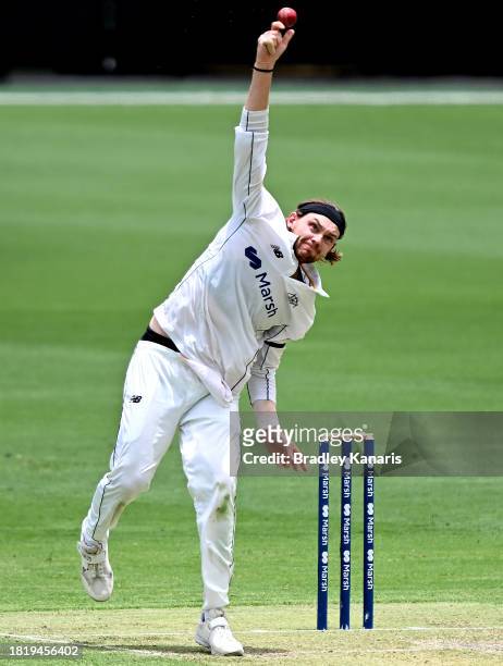Corey Rocchiccioli of Western Australia bowls during day two of the Sheffield Shield match between Queensland and Western Australia at The Gabba, on...