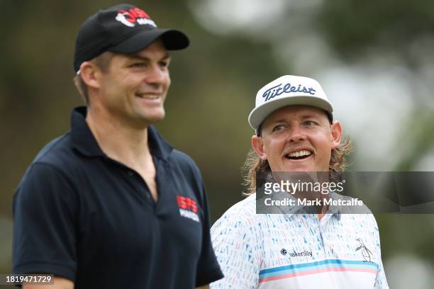 Cameron Smith and Richie McCaw play a practise round in the pro-am ahead of the ISPS HANDA Australian Open at The Australian Golf Course on November...