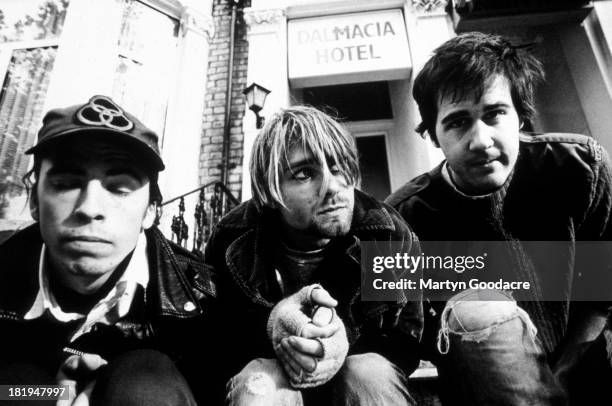Group portrait of American grunge band Nirvana in Shepherd's Bush, London, October 1990. L-R Dave Grohl, Kurt Cobain and Krist Novoselic.