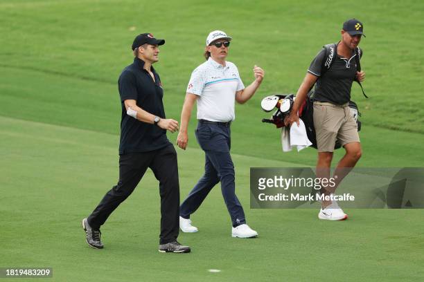 Cameron Smith and Richie McCaw play a practise round in the pro-am ahead of the ISPS HANDA Australian Open at The Australian Golf Course on November...