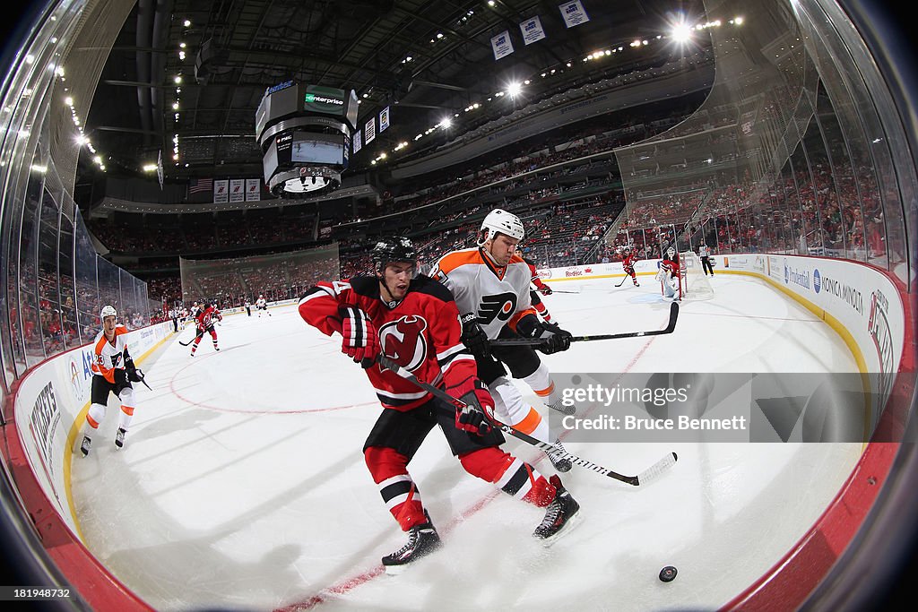 Devils Flyers Jay Rosehill of the Philadelphia Flyers hits Adam Henrique of the New ...