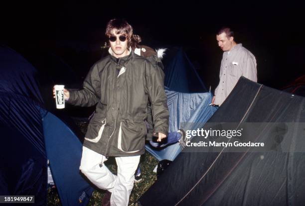 Liam Gallagher of Oasis backstage with brother Paul Gallagher, Glastonbury Festival, 1995.
