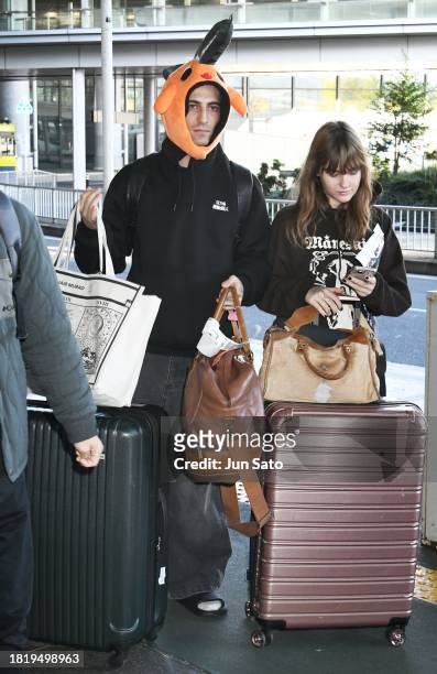 Damiano David of Maneskin is seen wearing Chainsaw Man Pochita winter hat as he arrives at Narita International Airport on November 29, 2023 in...