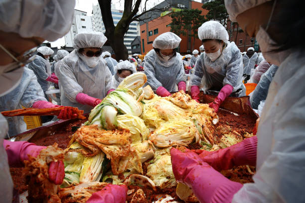 KOR: People Donate Kimchi To The Poor At South Korean Temple