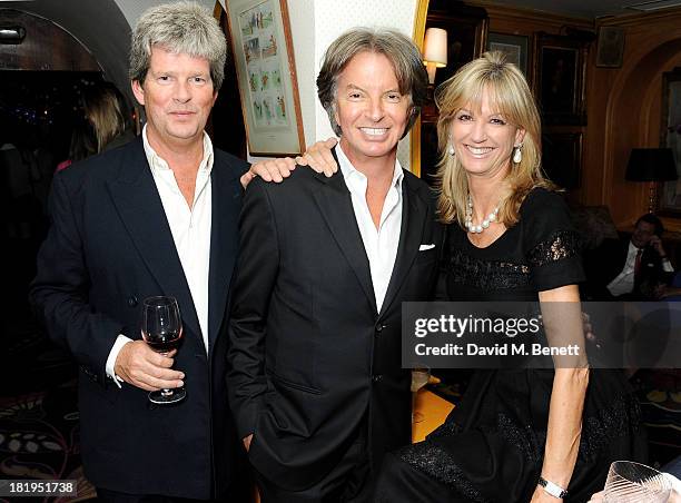 Guy Sangster, Richard Caring and Fiona Sangster attend Annabel's 50th anniversary celebration featuring a performance by Jamie Cullum on September...