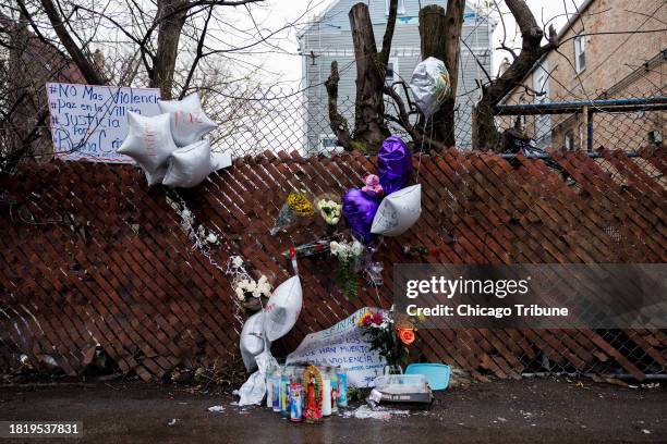 Memorial sits in an alley where Reyna Cristina Ical Seb was found fatally shot in the Little Village neighborhood the prior week in Chicago, Feb. 27,...