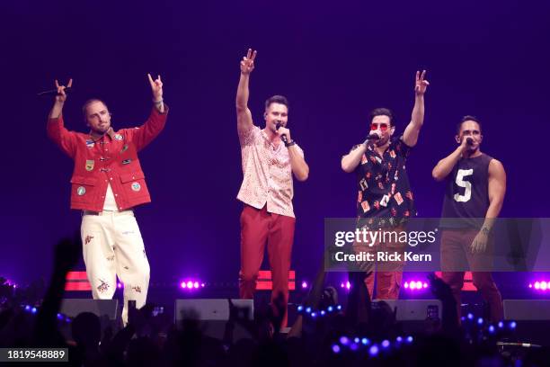 Kendall Schmidt, James Maslow, Logan Henderson and Carlos PenaVega of Big Time Rush perform onstage during iHeartRadio 106.1 KISS FM's Jingle Ball...